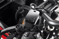 Covers for brake and clutch fluid reservoirs.