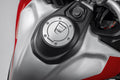 Hands-free tank filler plug.