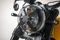 Headlight trim in stamped sheet.