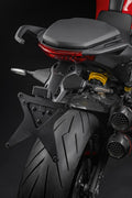 Underseat aluminium number plate holder.