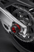 Swinging arm slider.