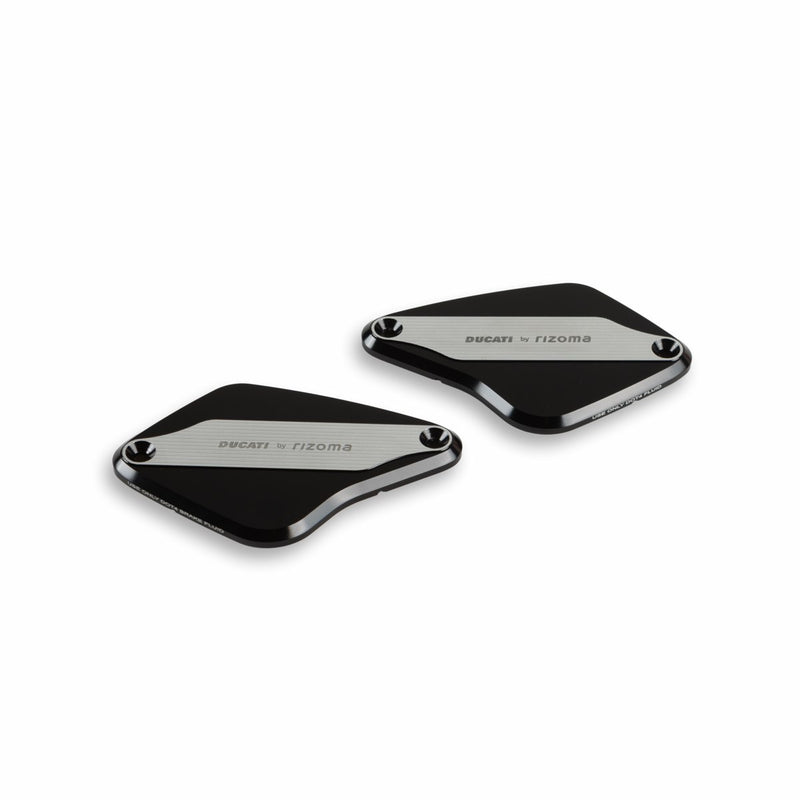 Covers for brake and clutch fluid reservoirs.