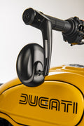 Handlebar RH rear-view mirror.