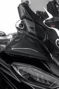 Smoke-tinted side deflectors.